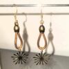Boucle d'oreille femme en cuir rond bronze et son étincelle dorée