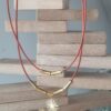 Collier femme en cuir rond orange double tour et etincelle