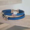 Bracelet enfant en cuir bleu et étoiles argentées