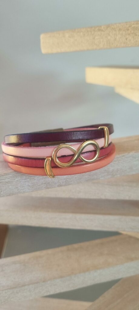 Bracelet femme cuirs tons de rose et passant infini doré