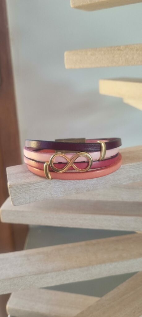 Bracelet femme cuirs tons de rose et passant infini doré