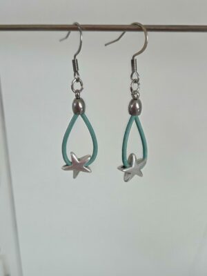 Boucles d'oreilles femme en cuir rond bleu et étoile argentée