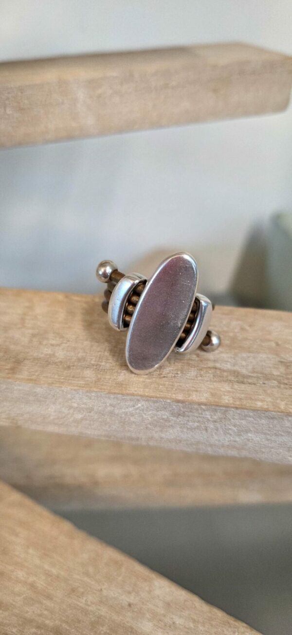 Bague femme cuir rond bronze et passants argentés