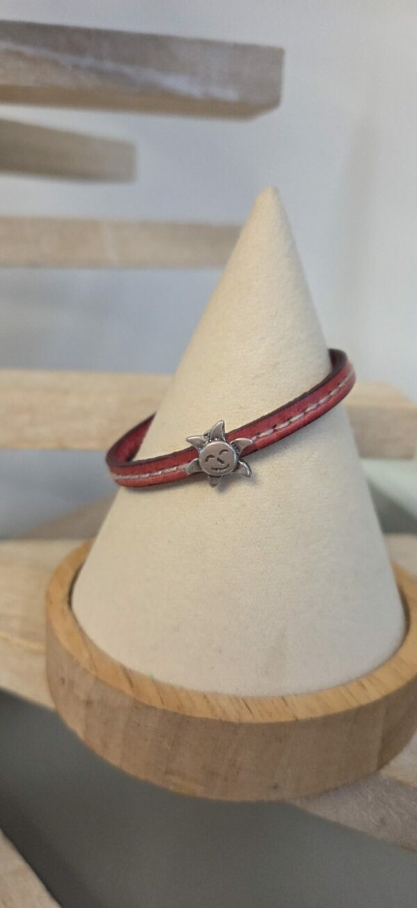 Bracelet enfant en cuir rose et soleil argenté