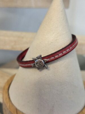 Bracelet enfant en cuir rose et soleil argenté