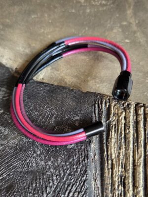 Bracelet femme cuir rond 2mm tons rose et mauve, tubes noirs