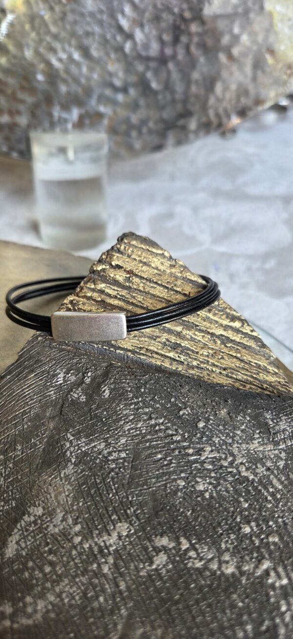 Bracelet homme cuir rond 1,5 noir et tube plat argenté