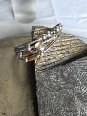 bracelet femme cuir rond gris et ses passants argent et doré