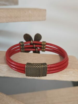 Bracelet femme cuir rond rouge et marguerite bronze