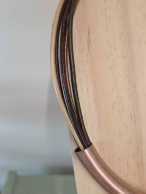 Collier femme cuirs ronds tons chauds et tubes cuivres
